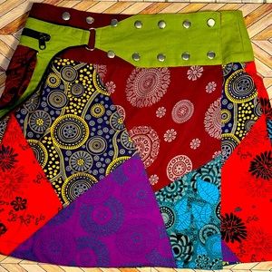Imported Tibetan mini-skirt with side pocket. Adjustable size 6-8